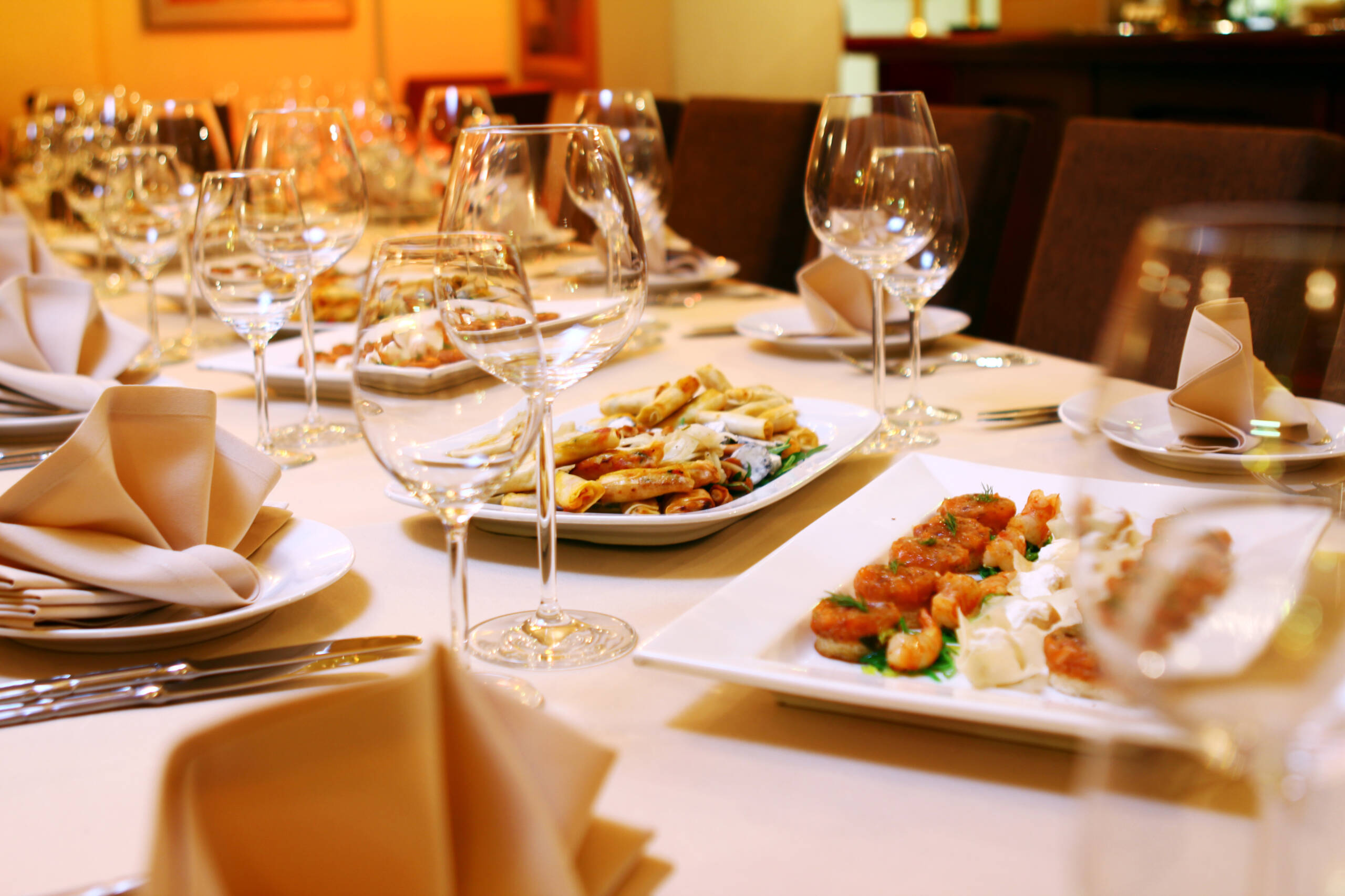 Banquet table with restaurant serving and snacks